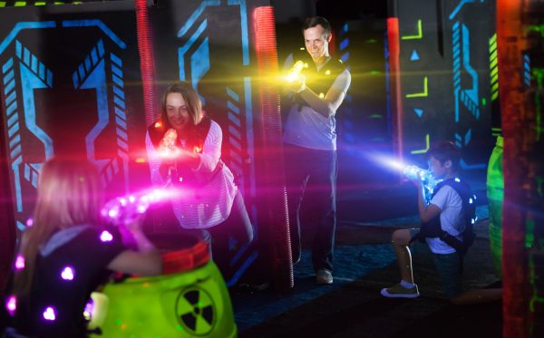 Family playing laser tag