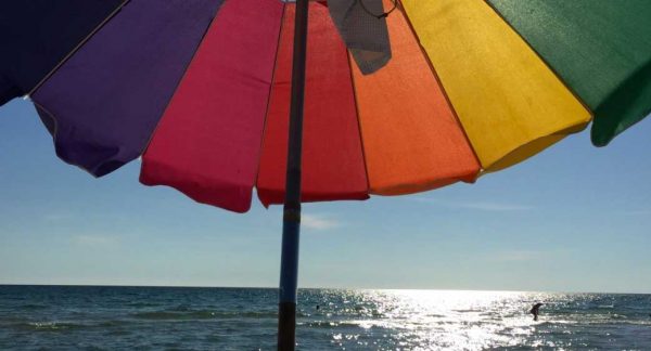 Rainbow Umbrella on the Beach